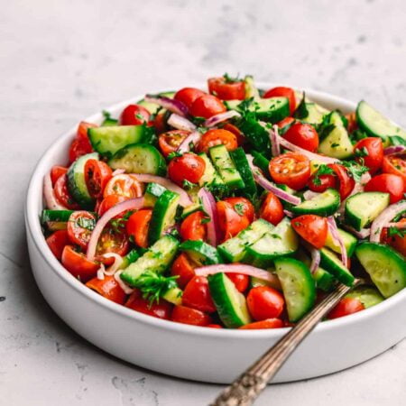 Looking for a quick and simple recipe for a refreshing cucumber tomato salad? This easy recipe is just perfect for a healthy side dish.